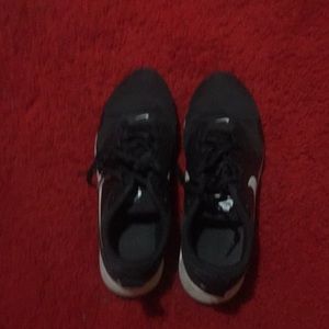 Pair of Nikes and name brand